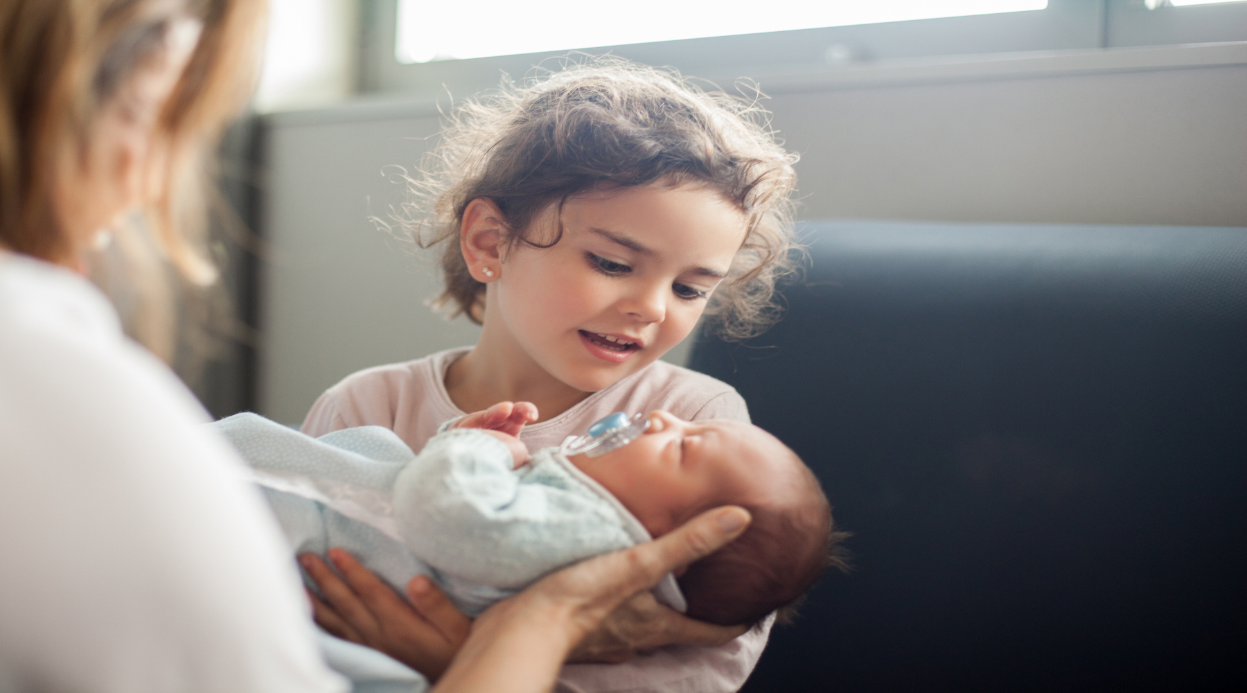 Family visiting after a childbirth